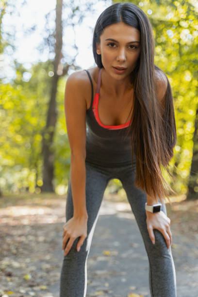 istock Pretty woman thinking about her next exercise 1184912662
