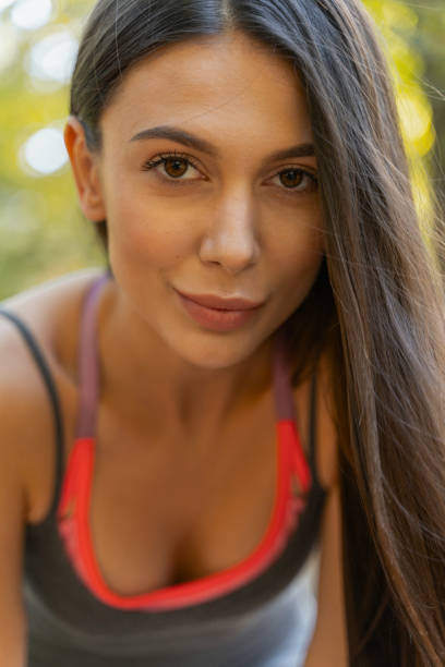 istock Pretty woman beginning her morning with jogging 1184912675