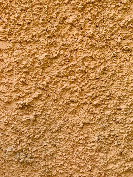 istock Background and texture of rustic wall in mustard color 1184916735