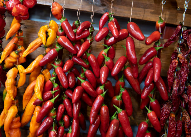 istock drying red and yellow peppers 1184918960