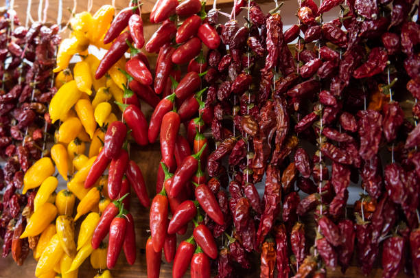 istock drying red and yellow peppers 1184919843