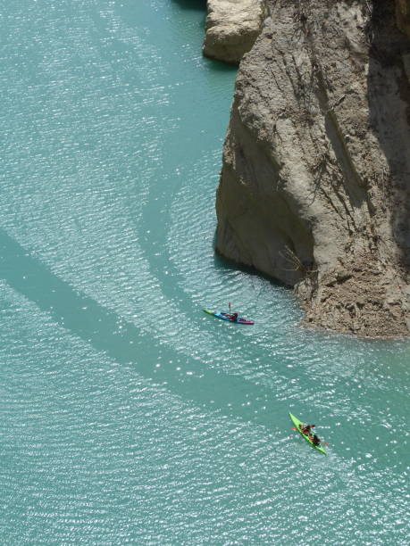 Gorge in the Congost de Montrebei, narrow pass in the noguera ribagorzana river. Natural border between Catalonia and Aragon. Montsec mountains. People in a Kayak