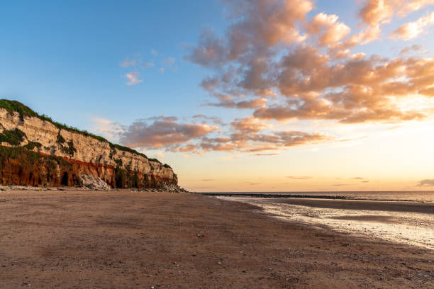 The Hunstanton Cliffs in Norfolk, England Evening light at the Hunstanton Cliffs in Norfolk, England, UK east anglia stock pictures, royalty-free photos & images