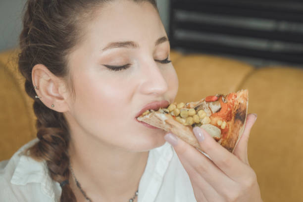 istock Enjoy pizza moment in restaurant 1184925422