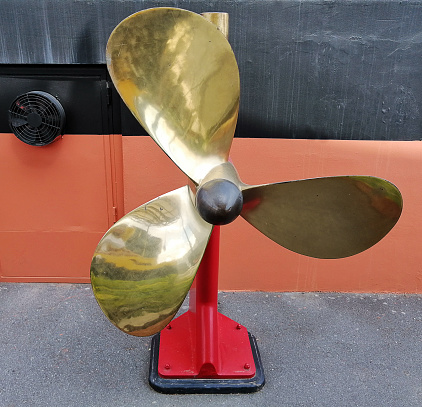 Istanbul, Turkey - August 30, 2019: An old hip propeller represented on the Golden Horn Bay in a sunny day in istanbul.