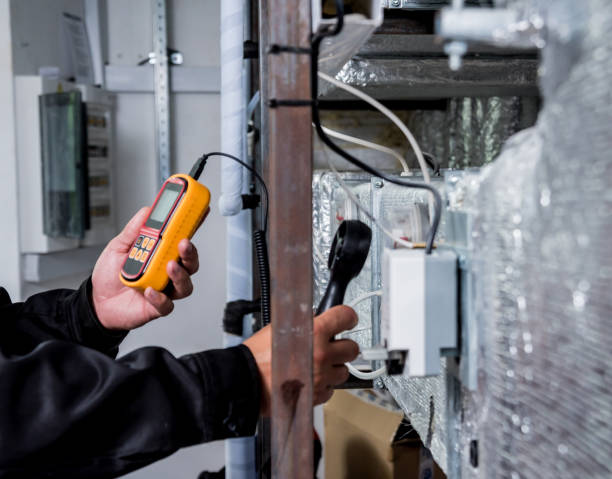 istock Technician use hand-held anemometer measuring air flowing measurement, wind speed and pressure. 1184933167