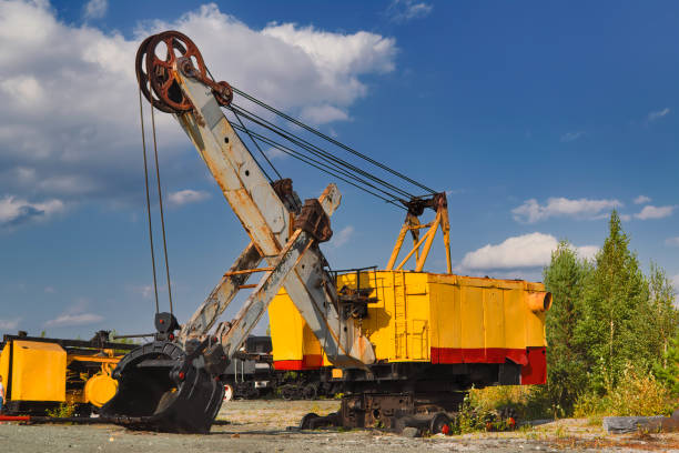 istock An old mining excavator against the sky. 1184934258