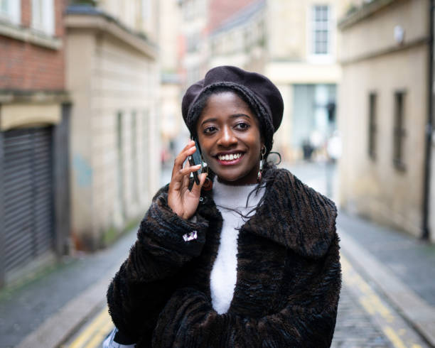 istock Young Woman using Mobile Phone 1184937311
