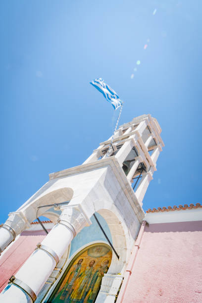SKIATHOS GREECE - JULY 30 2019; Church of Three Apostles on by the Old Port on island of Skiathos