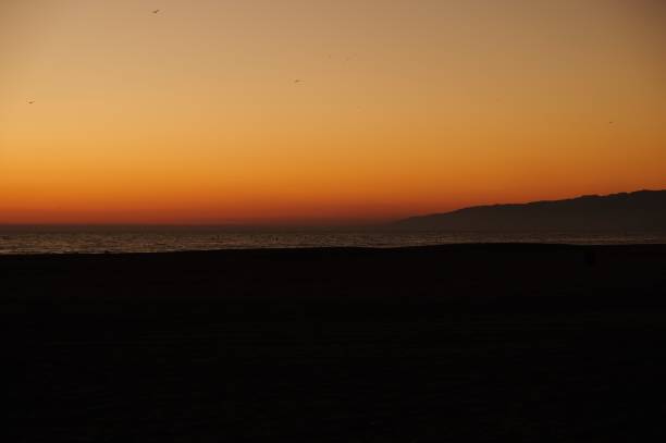 istock Sunset at Santa Monica Beach - Horizontal Format 1184958909