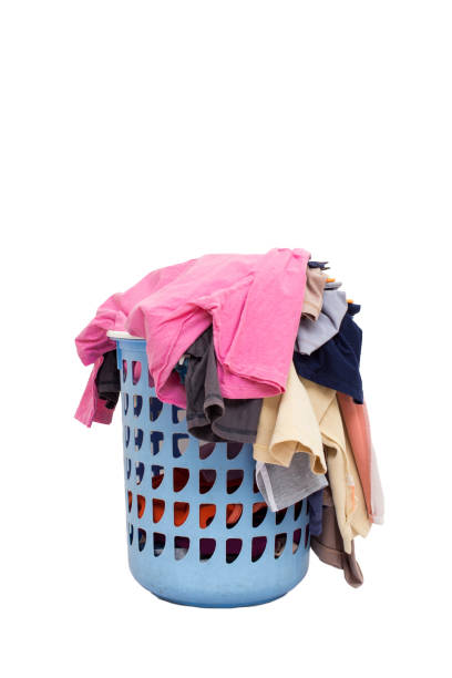 istock Basket with laundry isolated on white background 1184958935