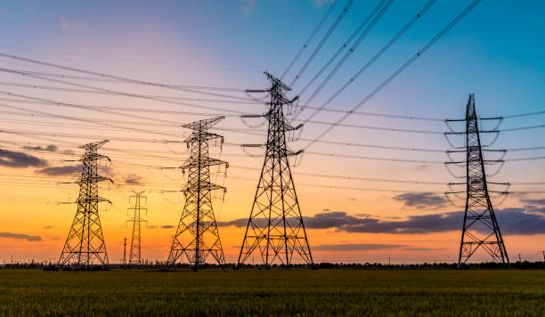 istock High voltage electricity tower sky sunset landscape 1184963902