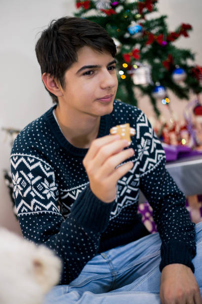 istock Man at home in front of fireplace 1184967833