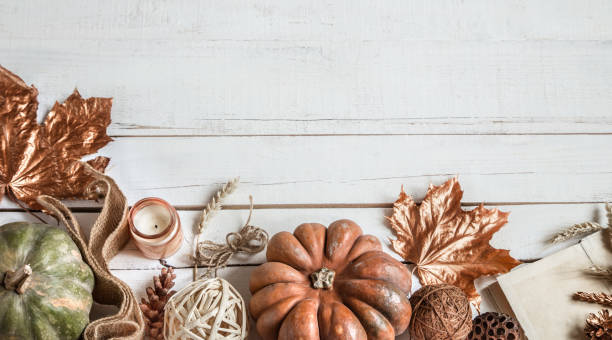 istock Autumn background with decorative items and pumpkin. 1184970152