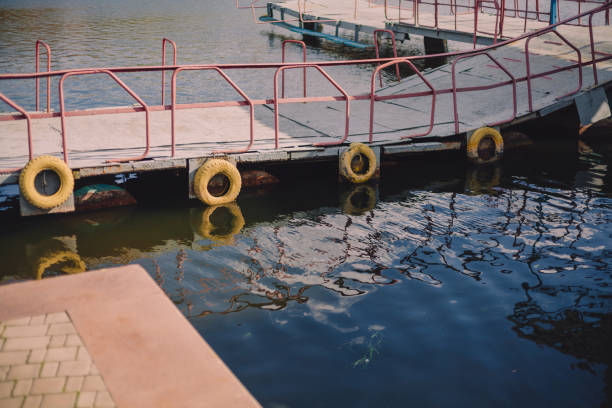 istock Metal bridge oncity pond 1184970951