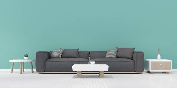 istock Perspective of modern luxury living room with dark fabrics sofa and side table on plain wall background,green, Minimal. - 3D rendering. 1184971216