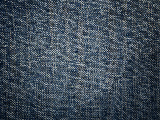 istock background of blue jeans denim texture. 1184971989