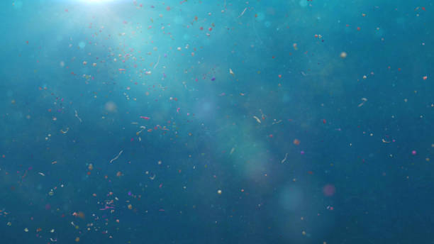 istock plastic pollution, micro nurdles and plastic particle in ocean water 1184974050
