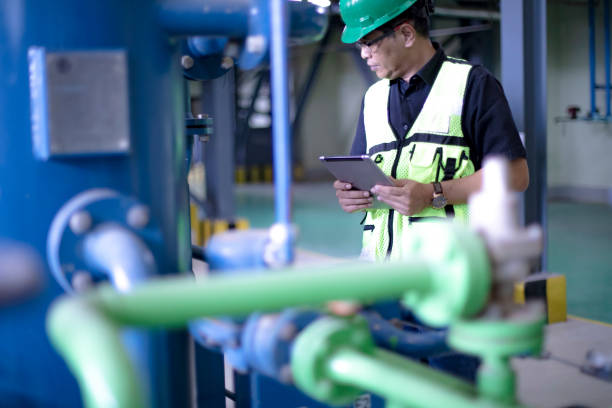 istock team work in the power plant installation 1184974125