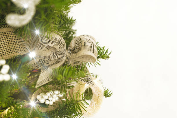 istock Tied burlap bow decoration on Christmas tree 1184974333