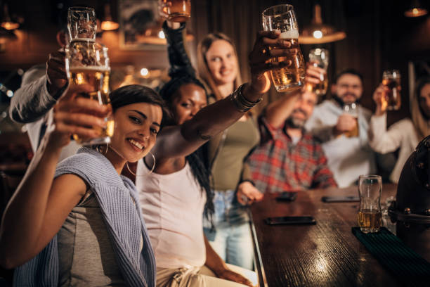 istock Friends enjoying in pub 1184974349