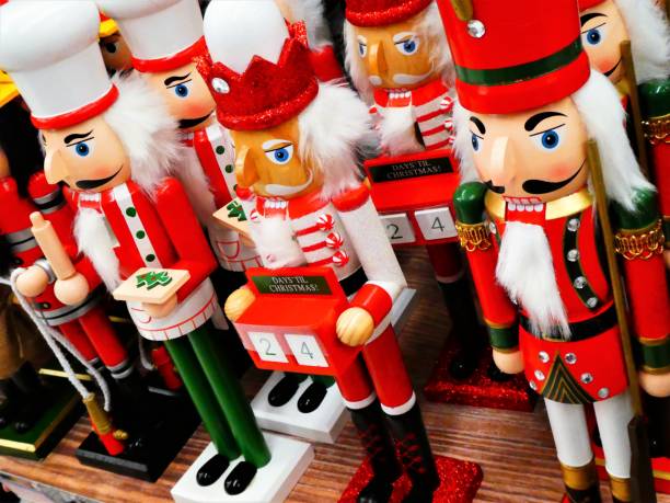 istock Various Christmas Wooden Nutcrackers Standing in a Row 1184975153