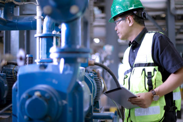 istock team work in the power plant installation 1184977243