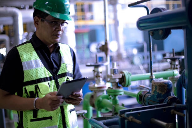 istock team work in the power plant installation 1184977256