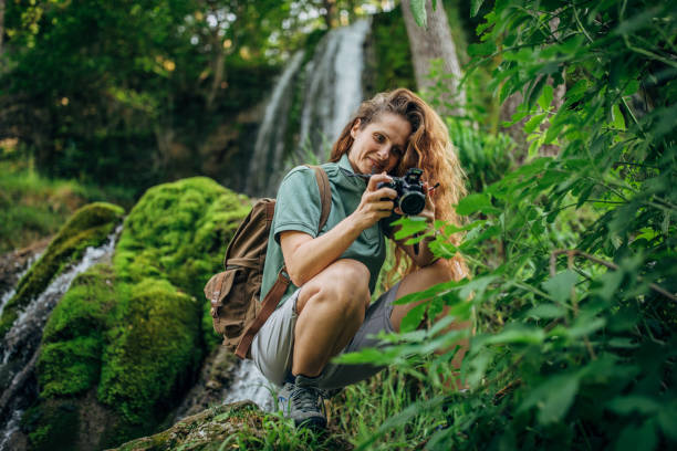 istock Female Biologist Photographing  Plants 1184979690