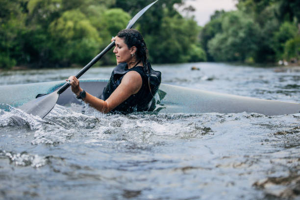 istock Beautiful  woman kayaking 1184981946