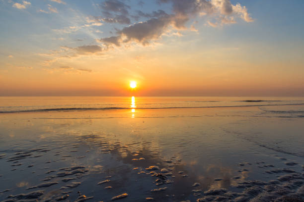 istock Tranquil sunrise in Hua Hin beach, Thailand 1184983288