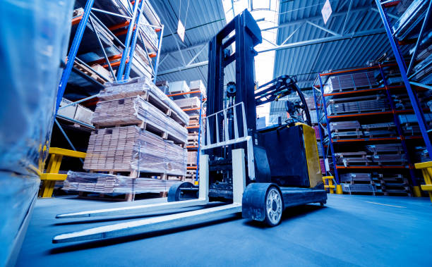 istock Forklift loader in storage warehouse ship yard. Distribution products. Delivery. Logistics. Transportation. 1184983596