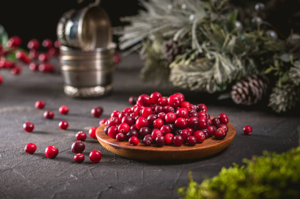 istock Cranberries in wooden bowl 1184983639