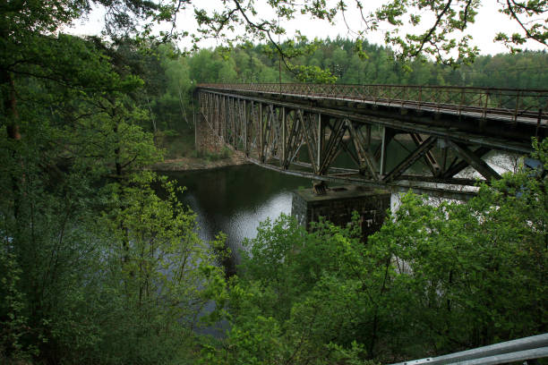 istock Train track on the historic iron railway bridge 1184984899
