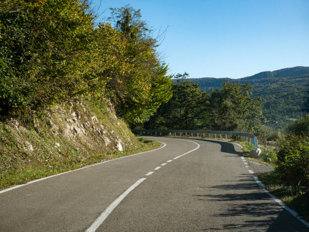 istock asphalt road in high mountains 1184997984
