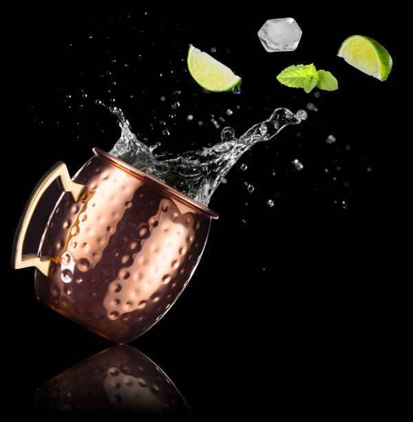 istock tilted copper mug of moscow mule cocktail 1185002412