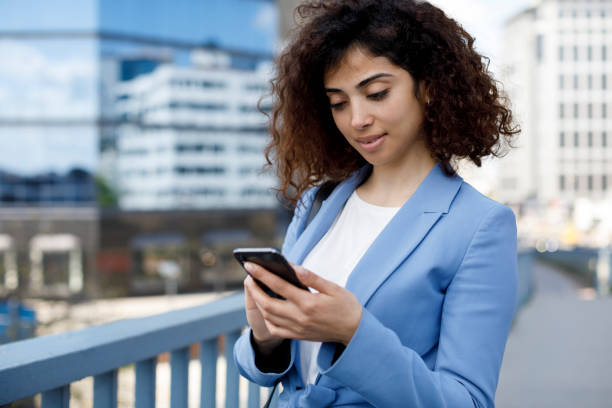 istock Businesswoman using phone 1185006868