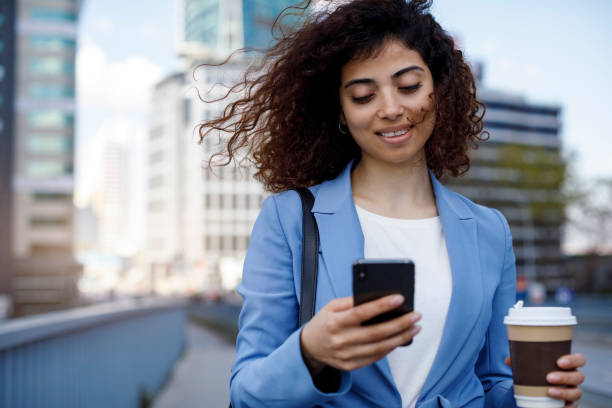 istock Young smiling businesswoman communting to work 1185007039