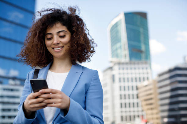 istock Young businesswoman using phone 1185007051