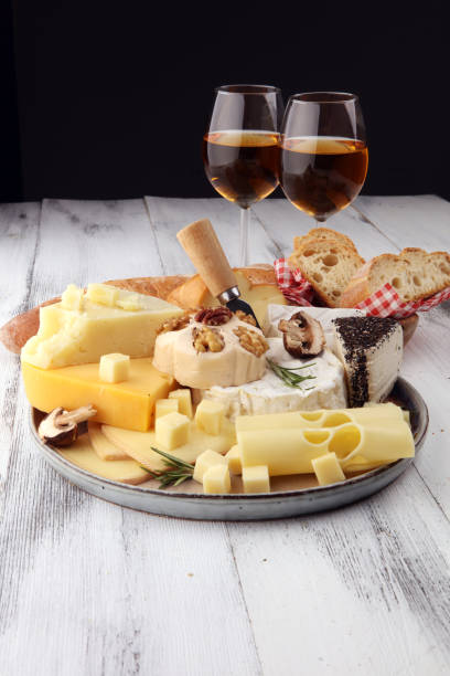 istock Different sorts of cheese. Cheese platter with different cheese and spice 1185007180