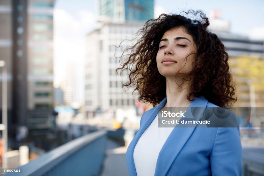 Businesswoman relaxing outdoor Breathing Exercise Stock Photo