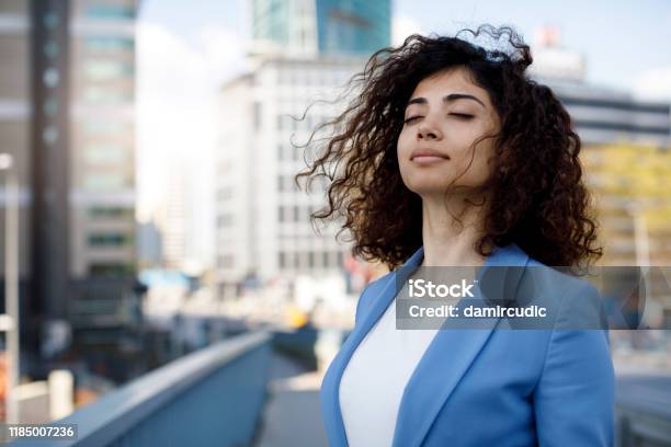 Businesswoman Relaxing Outdoor Stock Photo - Download Image Now - Breathing Exercise, Inhaling, Women