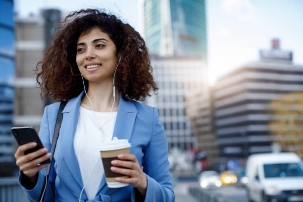istock Young happy businesswoman communting to work 1185007264