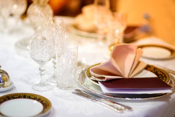 istock Beautiful table setting with crockery and flowers for a party, wedding reception or other festive event 1185010365