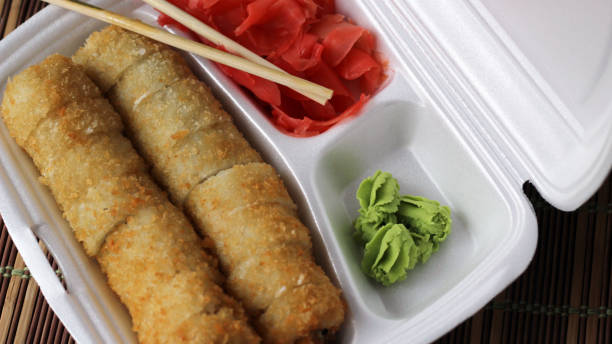 istock Salmon sushi rolls, japanese food 1185010486