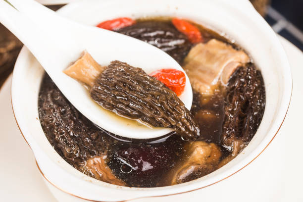 Morel ribs stew, Chinese cuisine Morel ribs stew, Chinese cuisine squab pigeon meat photos stock pictures, royalty-free photos & images