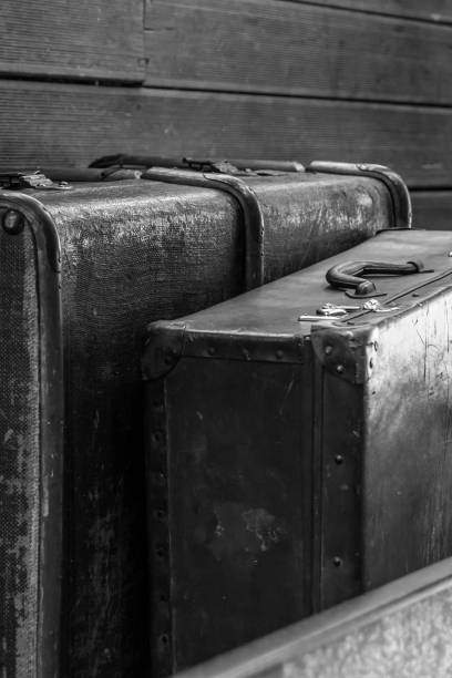 istock set old leather large suitcase stained background close up background travel 1185011578