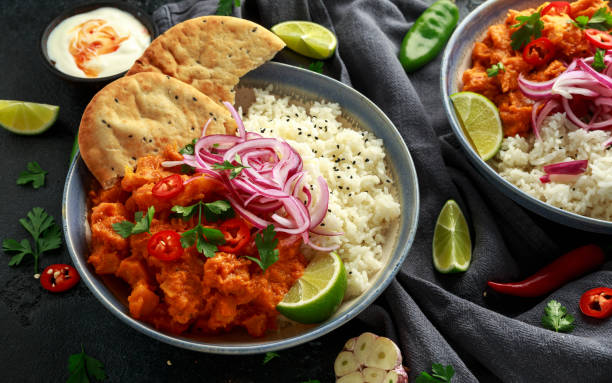 istock Meat free butternut squash curry with jasmine rice, pickled onions and naan bread 1185013882