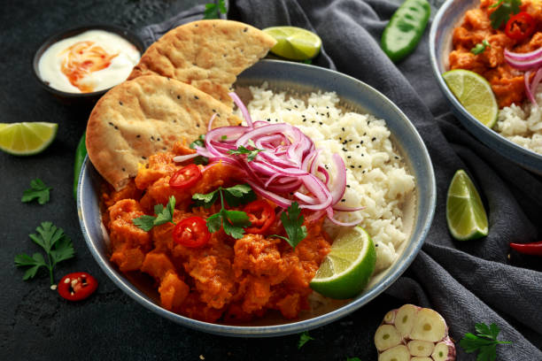 istock Meat free butternut squash curry with jasmine rice, pickled onions and naan bread 1185014454