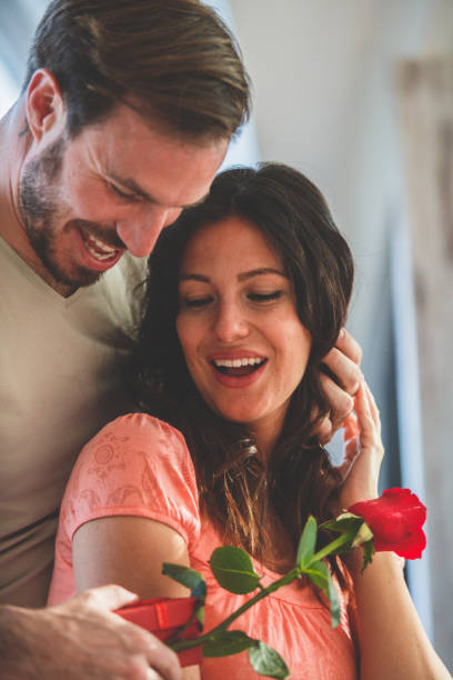 istock Giving his wife her anniversary gift 1185016026